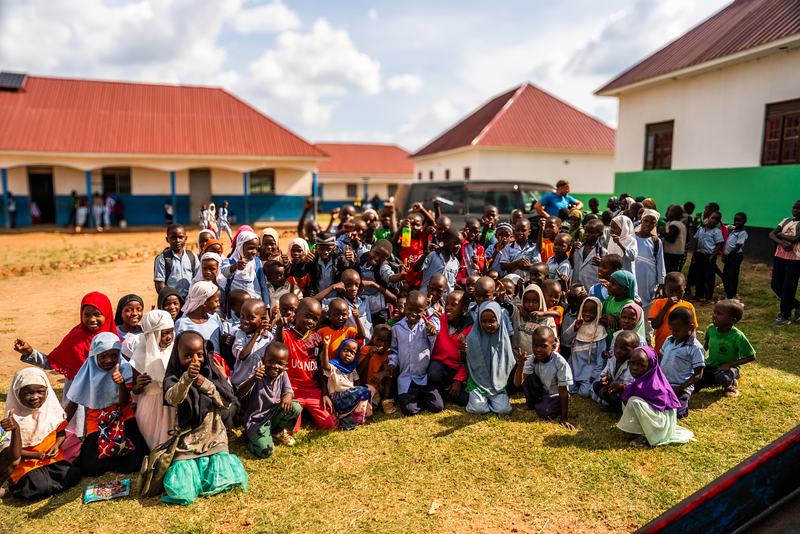 Pupils gathered together on the school grounds