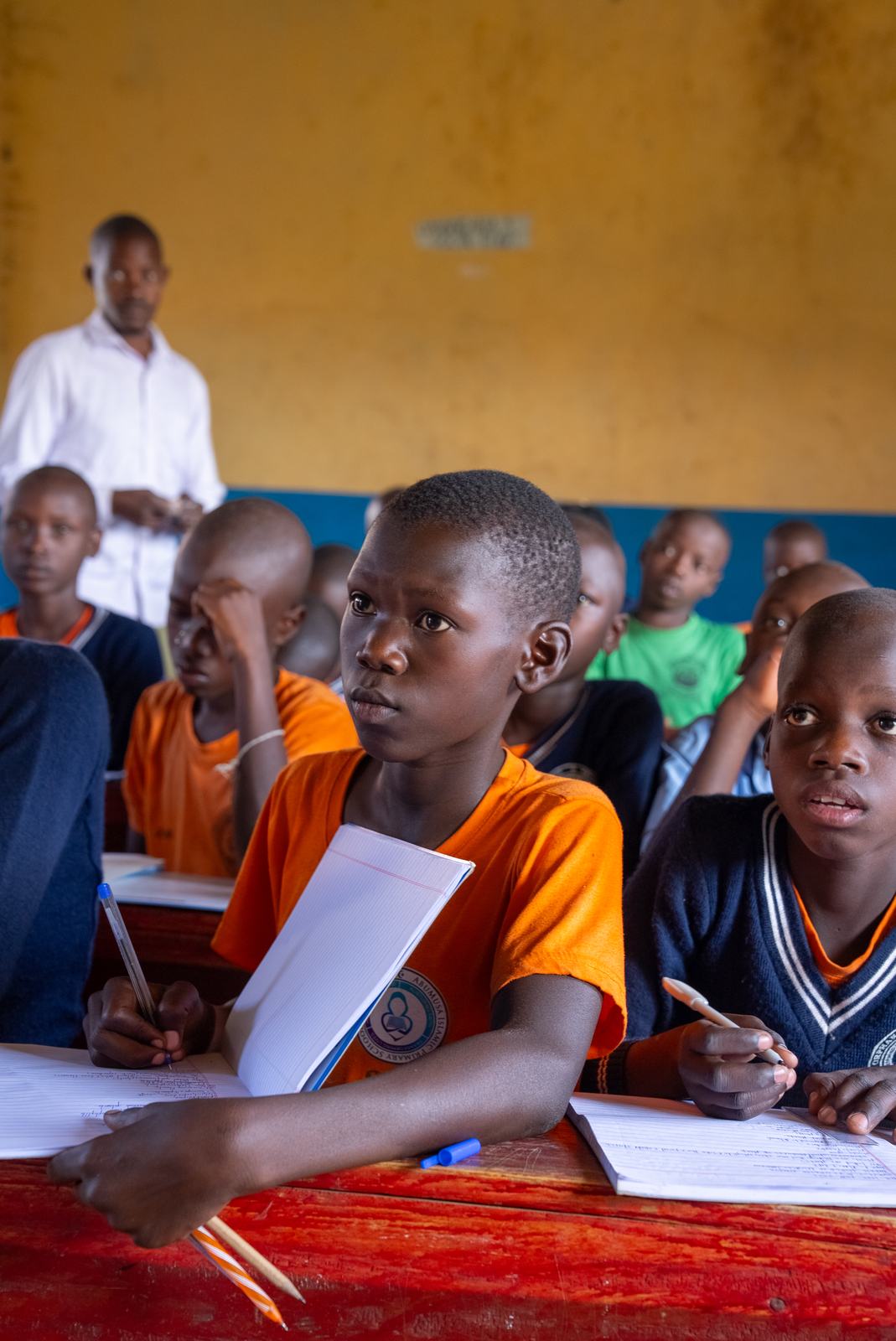 Pupils learning together in their classroom