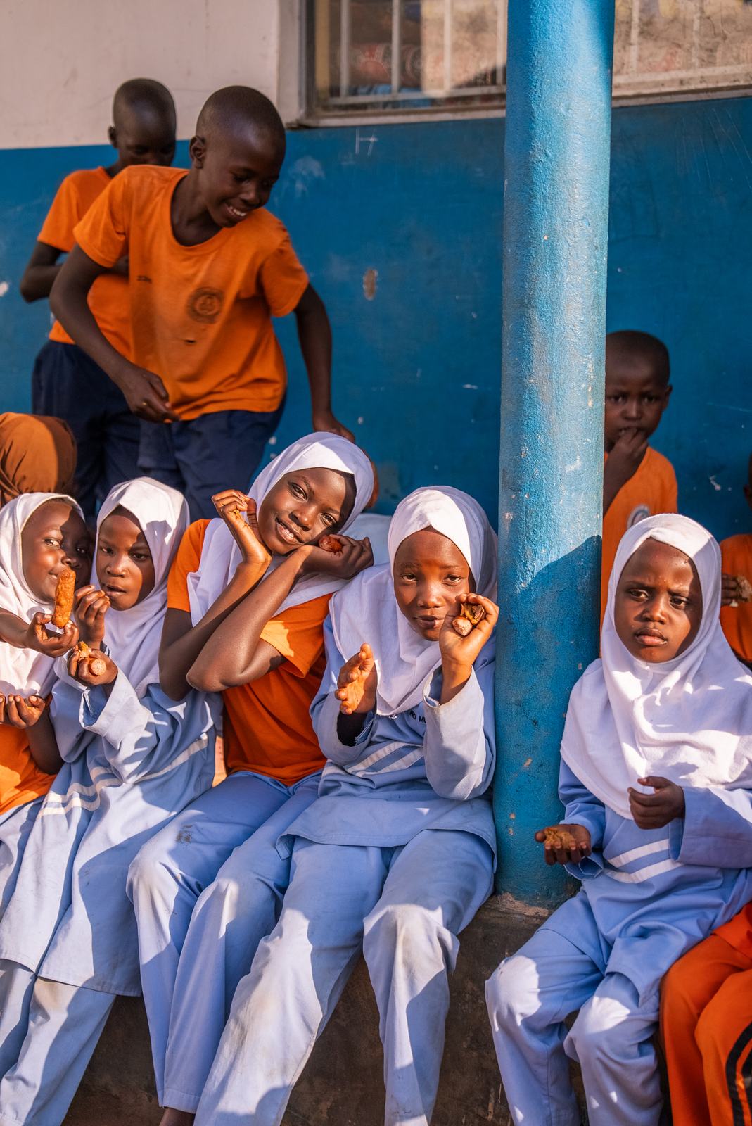 Pupils sitting together during school life