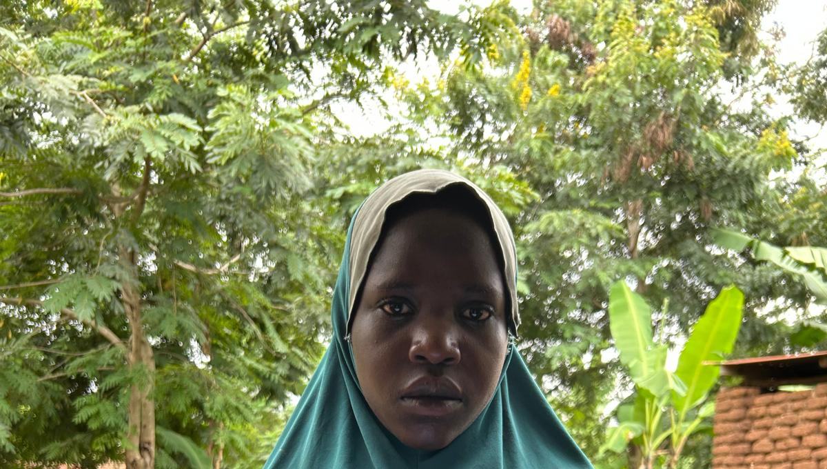 A girl in a green hijab