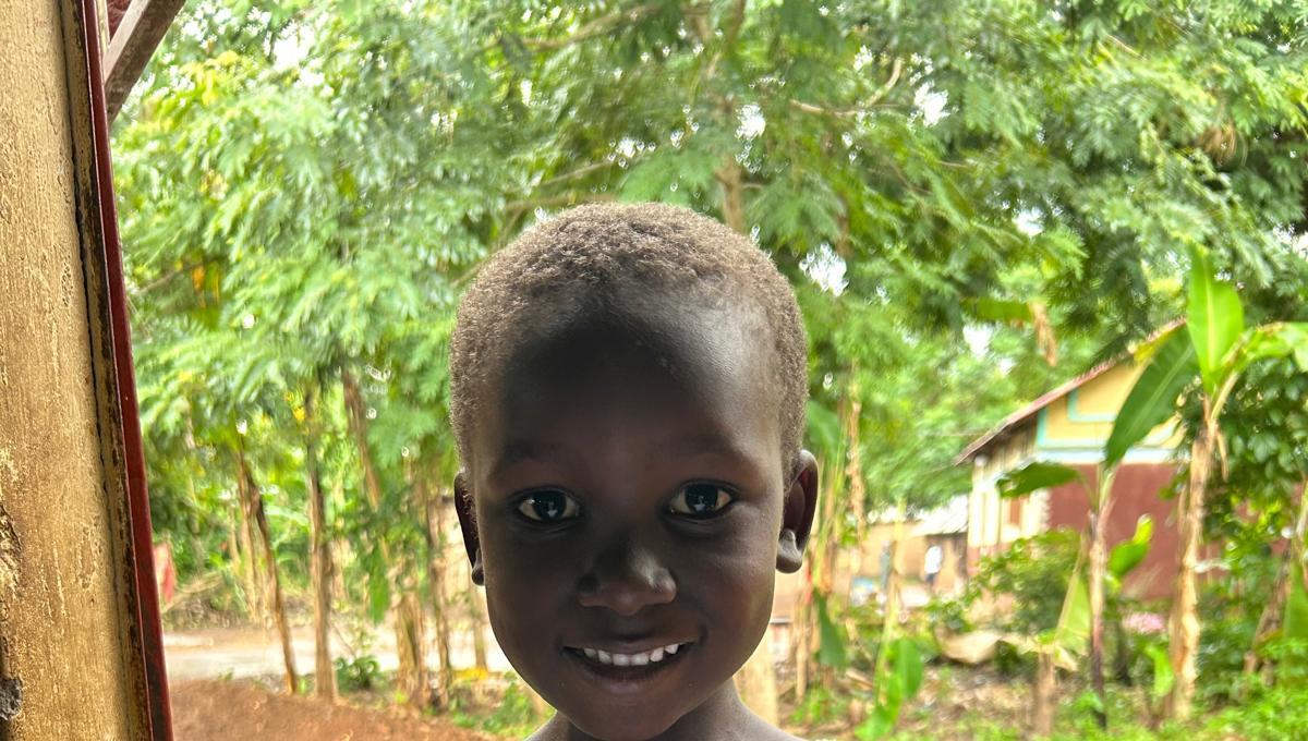 A smiling girl outside