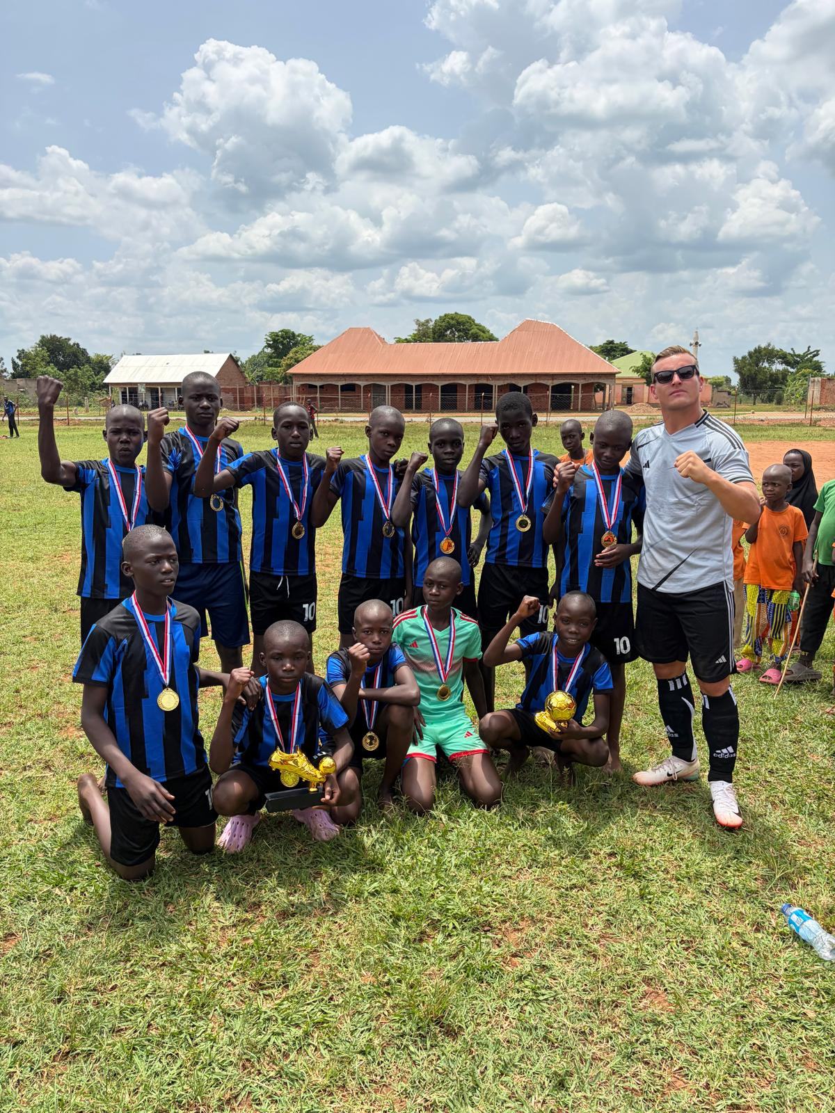The football team with their medals